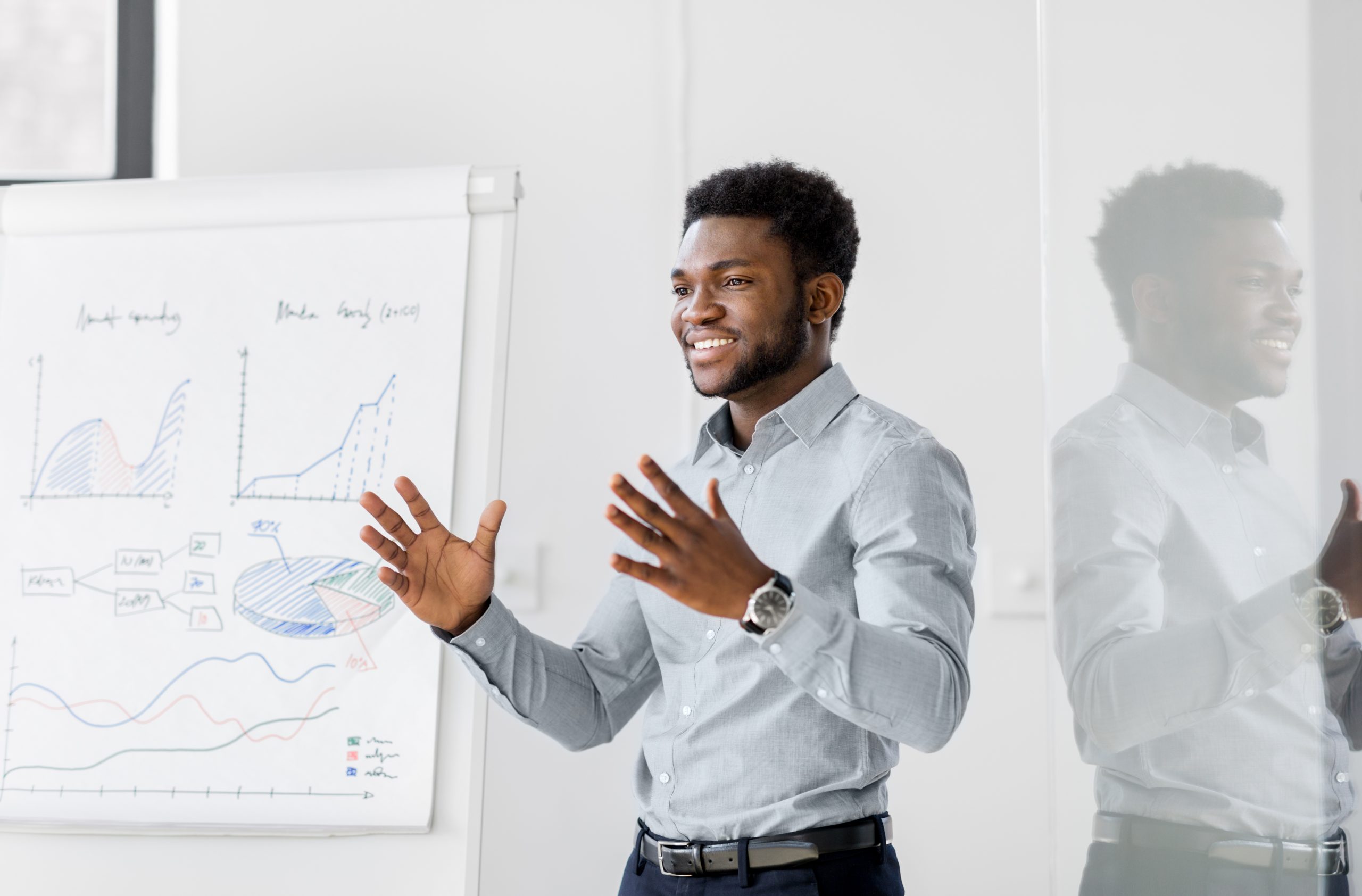 businessman with flip chart at office presentation