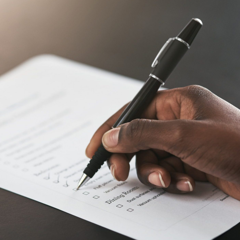Checklist tick, closeup and hands with a pen, agenda or planning administration at work. Receptionist, plan and person with notes on a document for schedule, time management or working on a goal